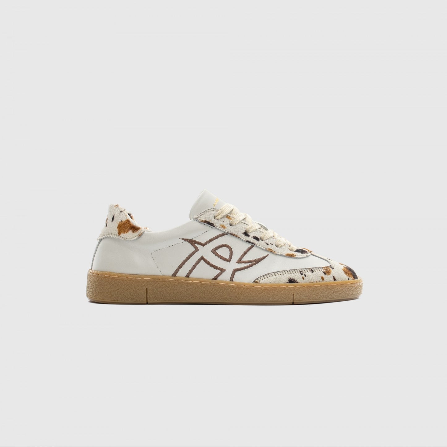 NOA sneaker in white / cow print - women