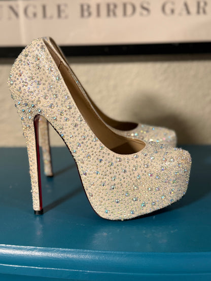 Christian Louboutin “bedazzled” Pumps