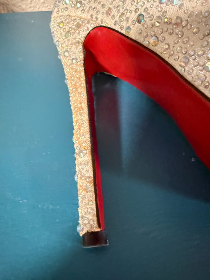 Christian Louboutin “bedazzled” Pumps
