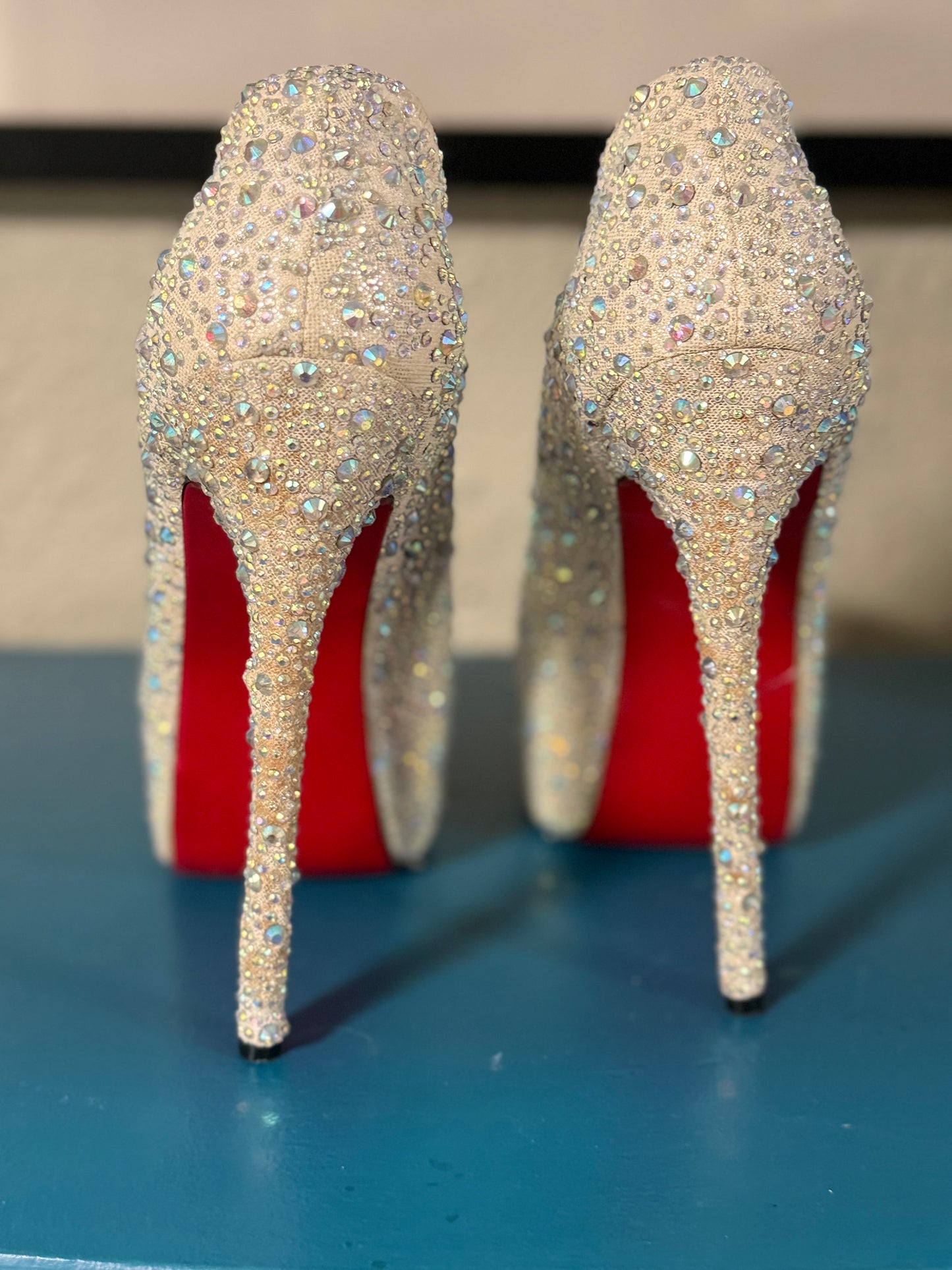 Christian Louboutin “bedazzled” Pumps