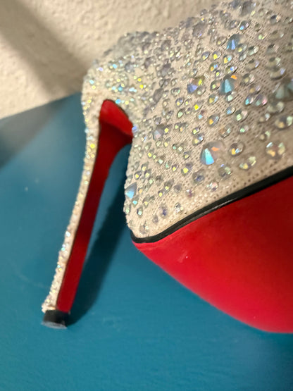 Christian Louboutin “bedazzled” Pumps