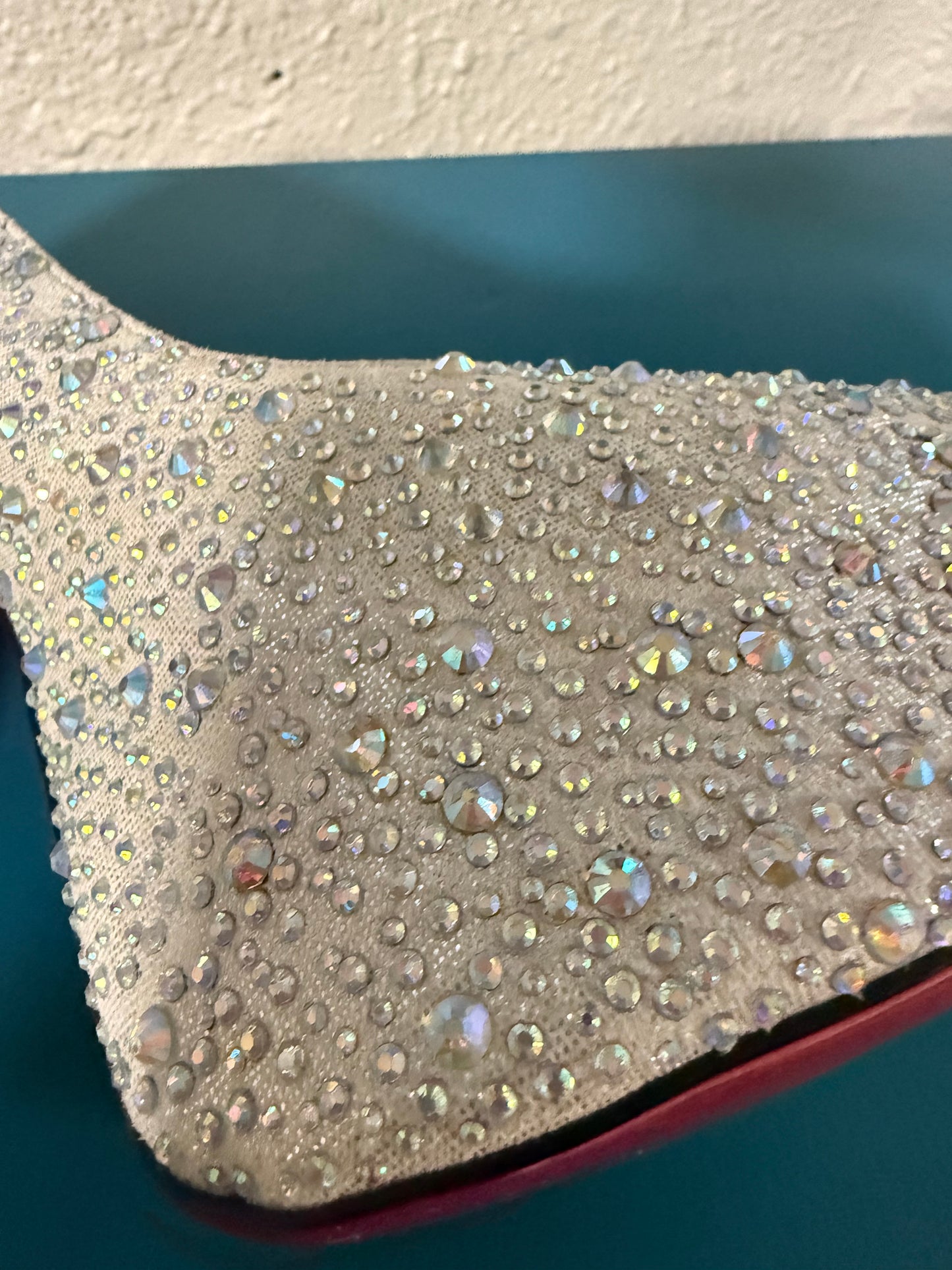 Christian Louboutin “bedazzled” Pumps