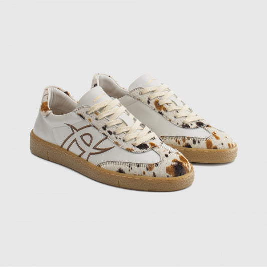 NOA sneaker in white / cow print - women